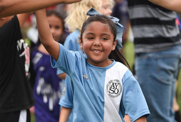 Kids playing soccer at AYSO Region 13